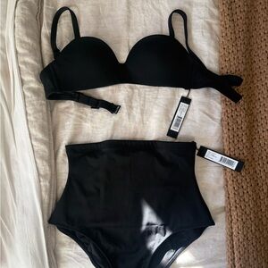Bikini by TA3 never worn still has the. Top was too small and couldn't return.